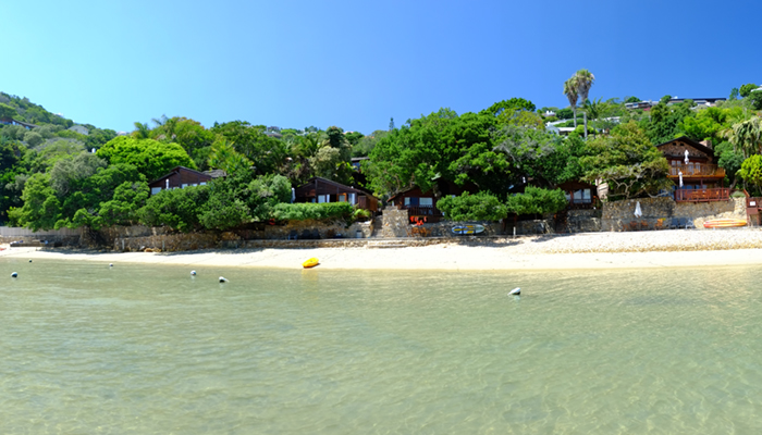 Image of Under Milkwood chalets and beach