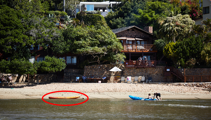 Image of kayaks in the water at Under Milkwood in Knysna