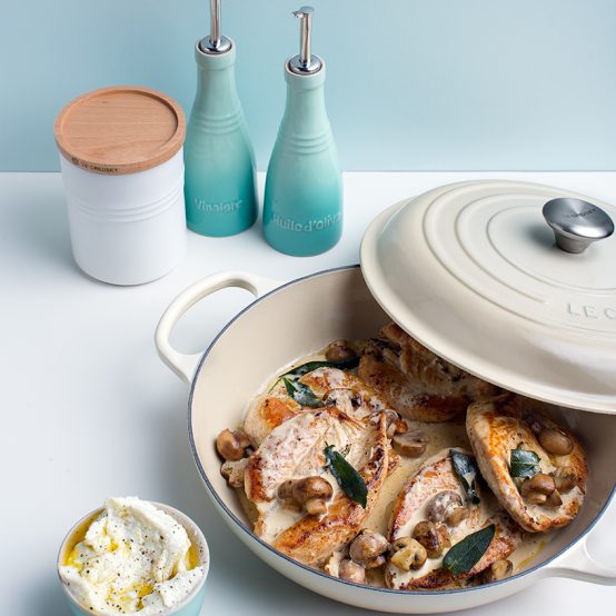Image of Lemon & Herb Roasted Chicken with Mushroom and Cream Sauce in Le Creuset cookware