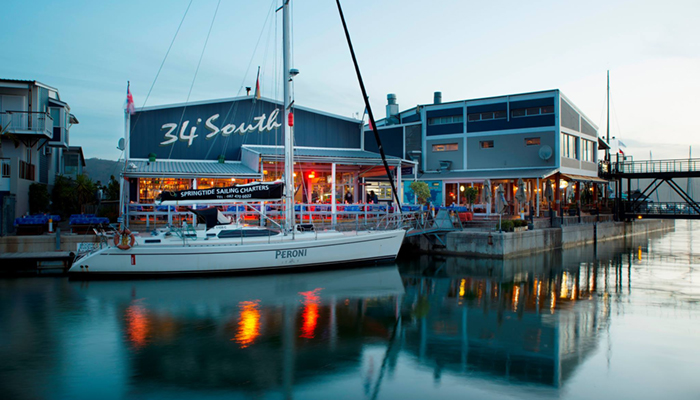 Image of early evening outside deck and boat at 34 Degrees South