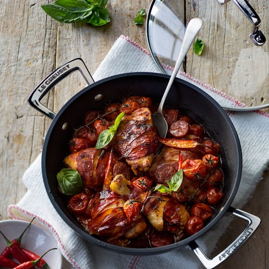 Image of chicken wrapped in Parmaham in Le Creuset dish