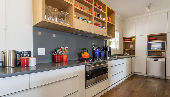Modern self-catering kitchen with Le Creuset cookware and full appliances at Number Eleven villa