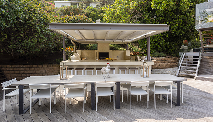 Large covered outdoor kitchen and dining area at Number Eleven villa in Knysna