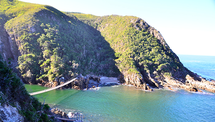 Suspension bridge over turquoise waters at Tsitsikamma National Park, South Africa