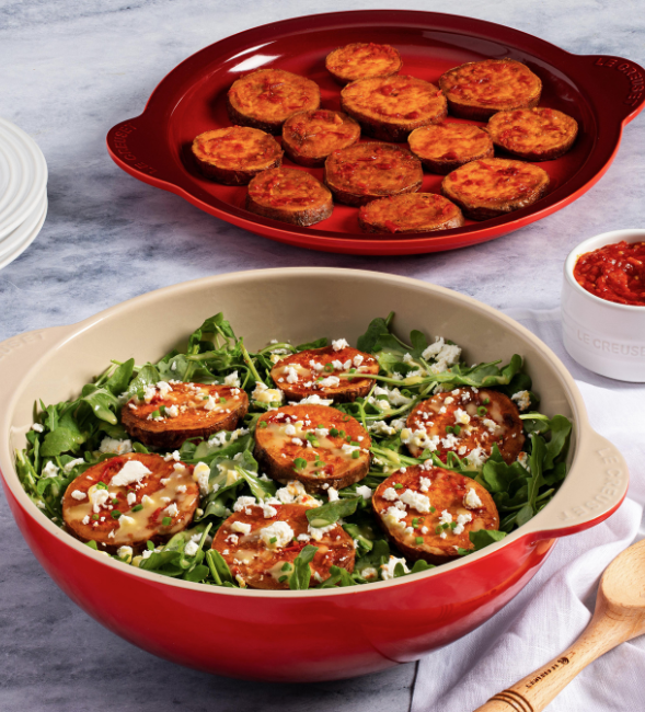 Harissa roasted sweet potato rounds with rocket, feta and honey